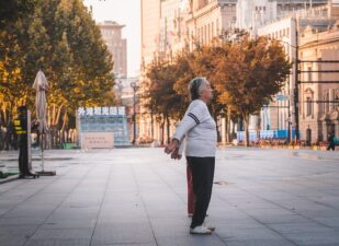 older women exercising in city