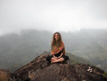 Woman meditating, achieving spiritual well-being