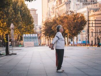 older women exercising in city